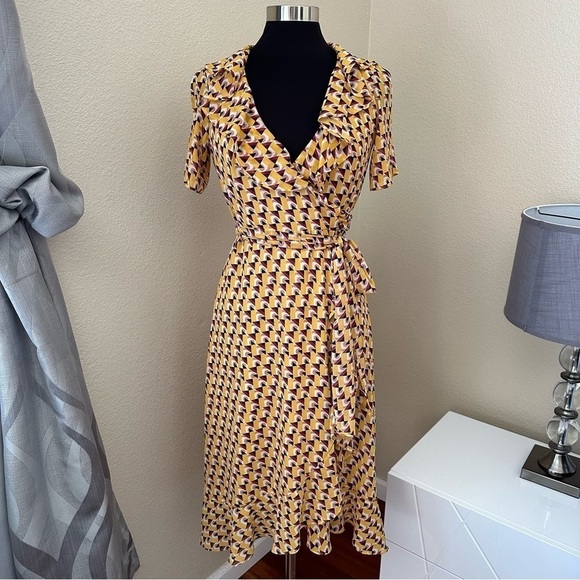 Donna Morgan Ruffled Yellow Geometric Print Wrap Short Sleeve
Dress - Picture 1 of 11